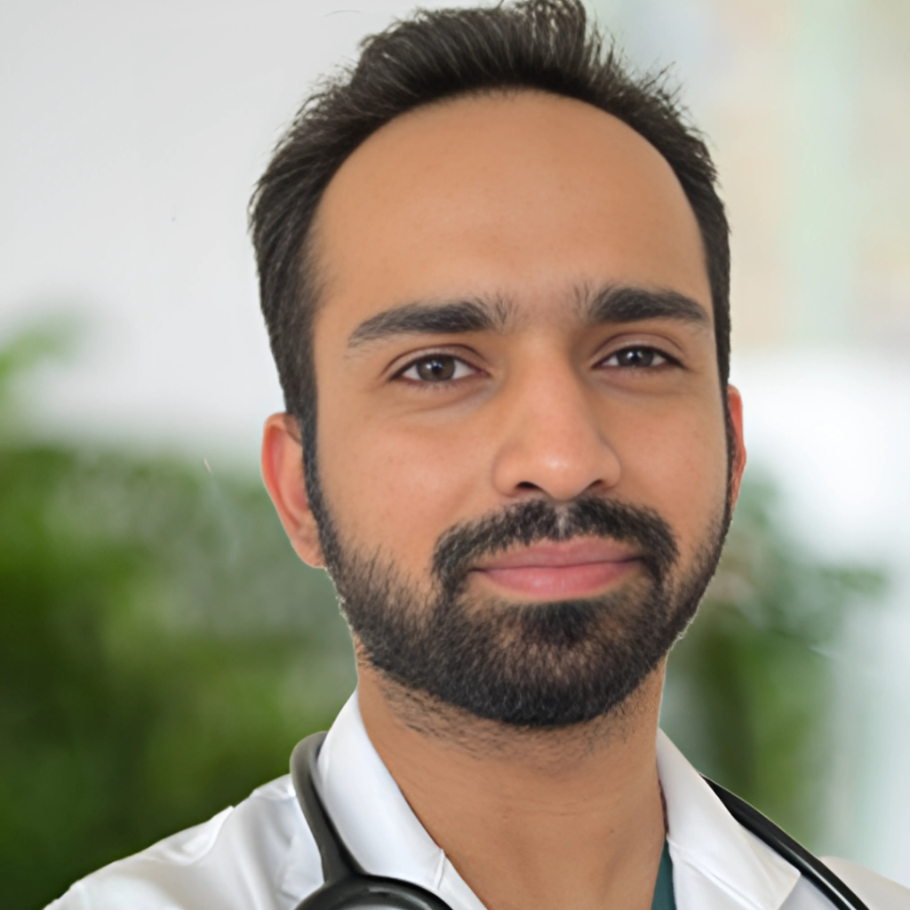 "Portrait of a confident male doctor with a stethoscope, representing the medical team at Synergy Super Speciality Hospital."