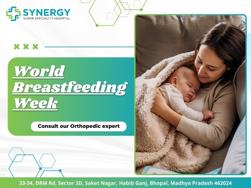 Mother breastfeeding newborn baby while resting on couch during World Breastfeeding Week awareness at Synergy Super Speciality Hospital, Bhopal.