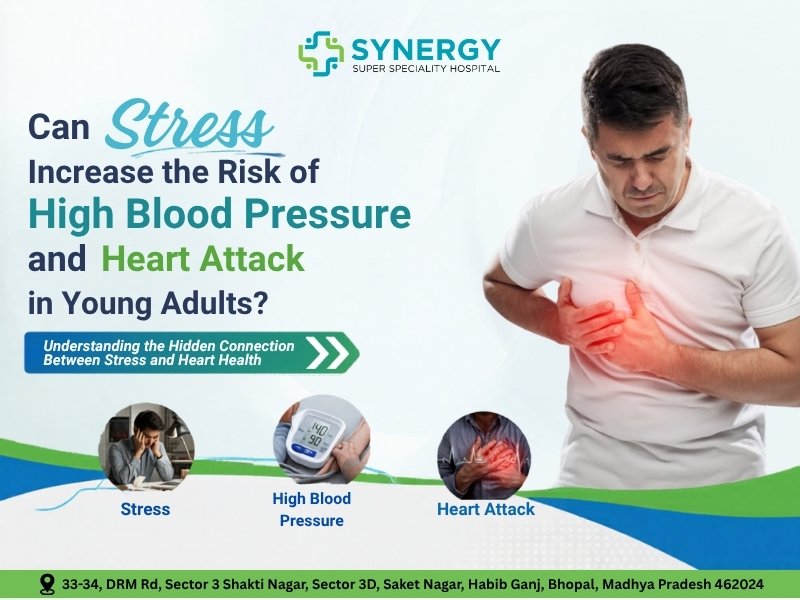 Young man holding his chest due to stress-related heart pain showing the link between high blood pressure and heart attack in young adults at a cardiology Hospital in Bhopal.