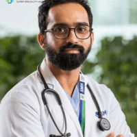 Experienced Doctor at Synergy Hospital A healthcare professional at Synergy Super Speciality Hospital in Bhopal wearing a white coat and stethoscope.