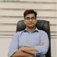 Healthcare Professional at Synergy Hospital A professional seated in an office chair at Synergy Super Speciality Hospital in Bhopal.
